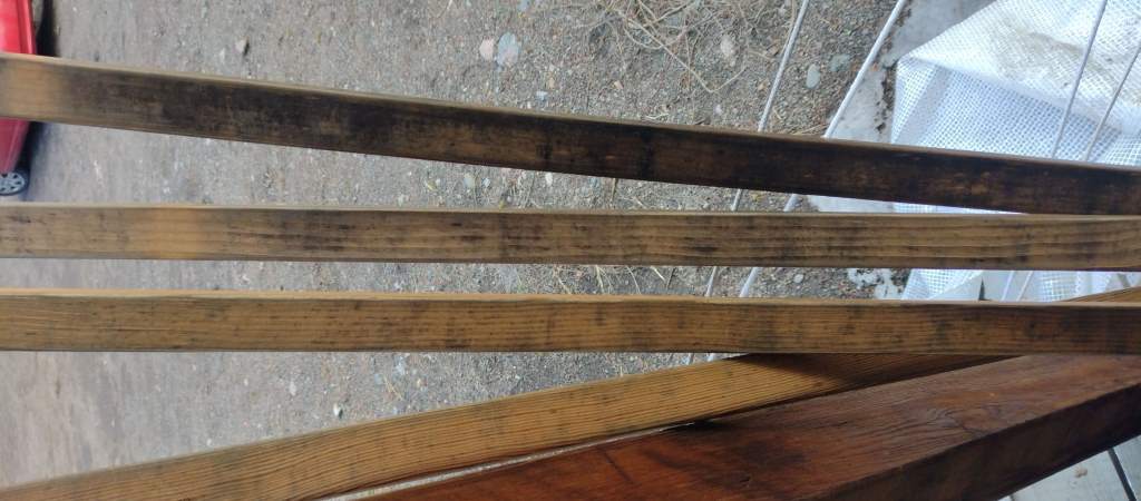 Wooden slats with mildew stains.