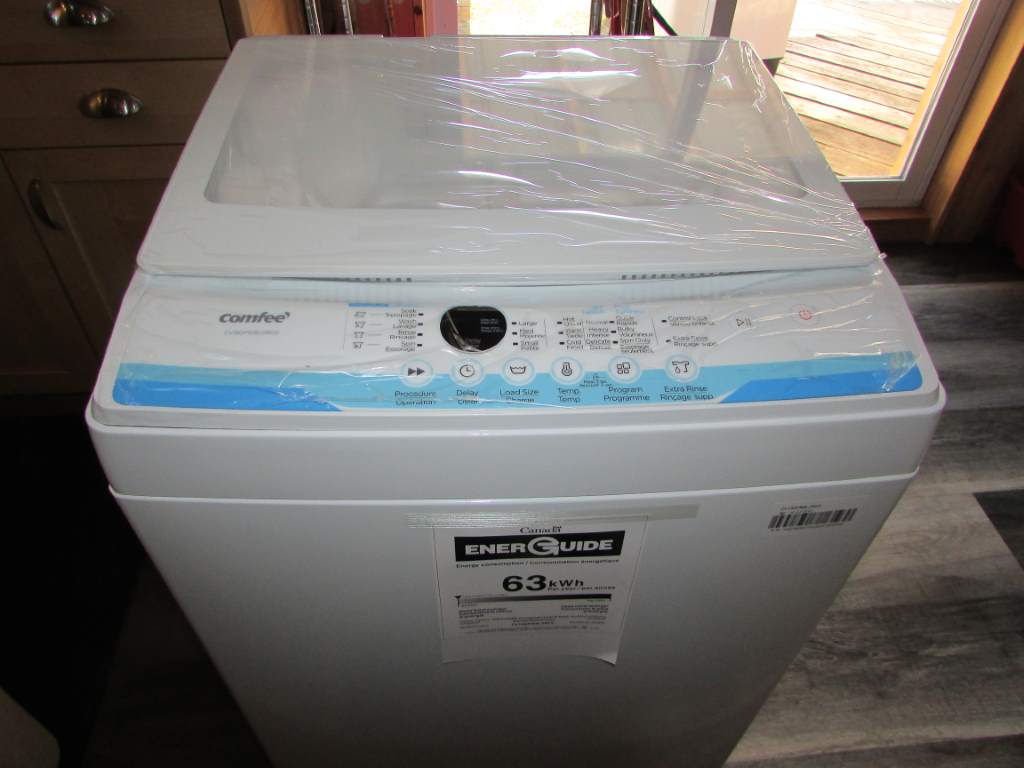 Brand new, apartment size washing machine.